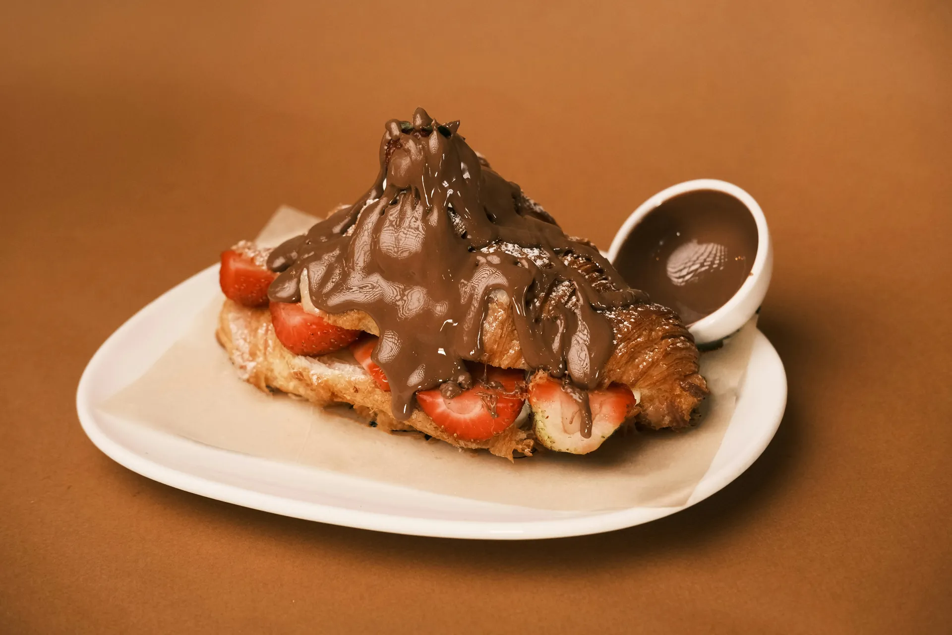 Chocolate croissant with strawberries